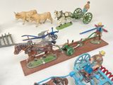 a lot of toy figurines that are on a table