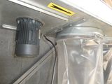 a picture of a metal object with a plastic bag on it