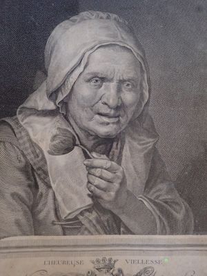 un dessin en noir et blanc représentant une femme tenant un bébé dans ses bras