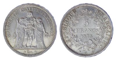 a silver coin with the image of a woman and a man on it