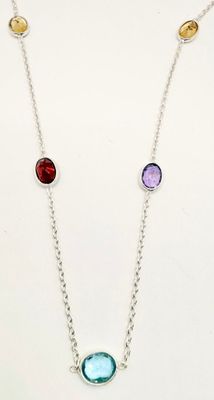 a necklace with multi colored stones on a silver chain