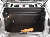 the back of a car with the trunk open and the luggage in the trunk