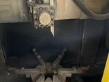 a machine that is working on a piece of metal