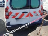 a white van with a red and white stripe on it