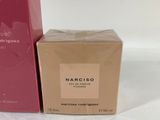two boxes of narcisoo perfume sitting next to each other