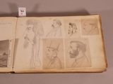 an old book with drawings of people and animals on it