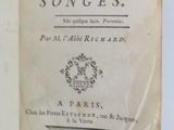 an open book with a picture of a bird on the cover