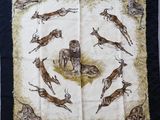 an image of a scarf with a picture of animals on it