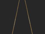 un collier en or composé d'une chaîne et d'une perle sur fond noir