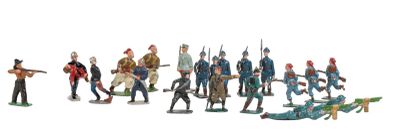 a lot of figurines that are standing in a line