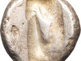 a silver coin with an image of a woman on it