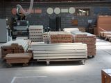 a large warehouse filled with lots of wooden planks