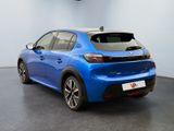 the rear view of a blue car in a showroom