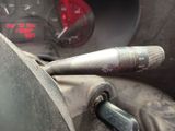 a close up of a car dashboard with a microphone in it