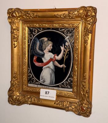 tableau représentant un ange tenant une fleur, dans un cadre doré