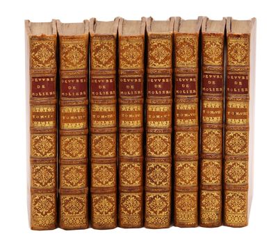 six books in a row on a white background