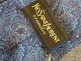 a close up of a tie with a label on it