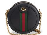 a black round bag with a green, red and green stripe on the side