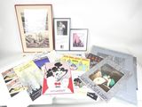 a lot of books and pictures on a table