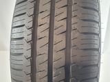 a close up of a tire on a white surface
