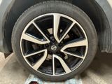 a close up of a tire on a vehicle