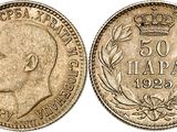 an old coin with a crown on top of it