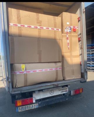 a truck that has a lot of boxes in the back