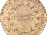 a close up of a coin on a white background