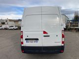 a white van that is parked in a parking lot