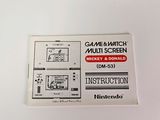 a sticker on the back of a nintendo game console
