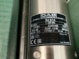 a close up of a metal object with a label on it