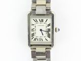 an image of a silver wrist watch with roman numerals on it