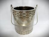 a silver bucket with a handle on a white background