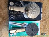 a box with a shower head and a shower head