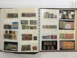 an open book with a lot of stamps on it