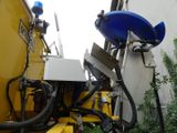 a picture of a machine that is sitting on the side of a building