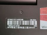 a close up of a laptop with a barcode on it