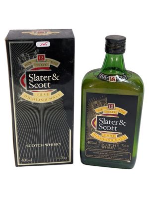 a close up of a bottle of scotch whisky next to a box