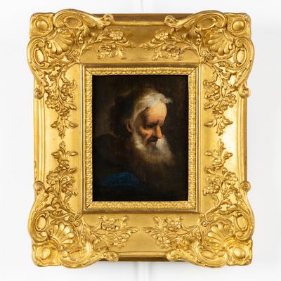 un tableau représentant un vieil homme barbu, dans un cadre doré