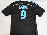 a close up of a soccer jersey with the number 9 on it