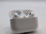 two airpods sitting in a case on a table