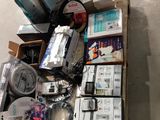 a box full of assorted items on the floor