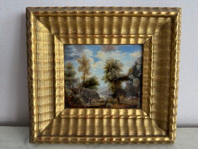 une image d'un tableau représentant un paysage dans un cadre doré