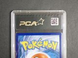 the pokemon game is in a plastic case on a table