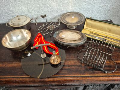 a wooden table with a bunch of different items on it