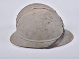 a helmet that is sitting on a white surface