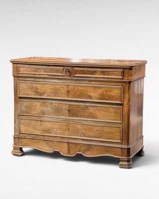 an image of a wooden chest of drawers on a white background