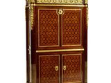 an image of a cabinet with a door and drawers