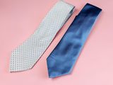 two ties on a pink background