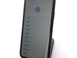 a cell phone that is sitting on top of a stand